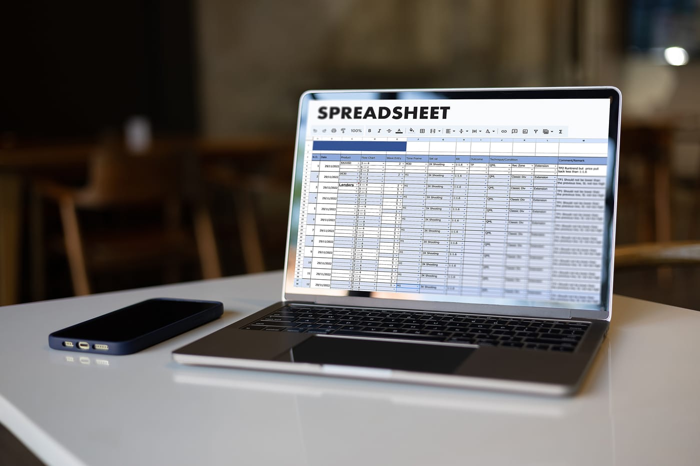 Laptop displaying a dense spreadsheet, illustrating the limits of tracking subscriptions manually